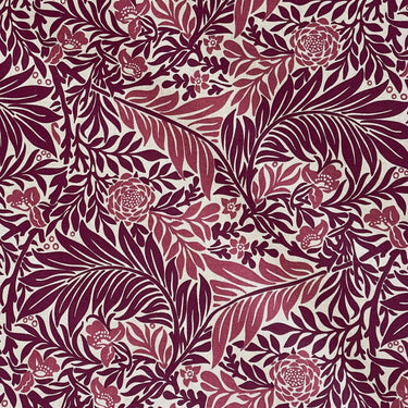 Close-up of red floral cotton blend fabric with leafy William Morris inspired Larkspur pattern, ideal for upholstery